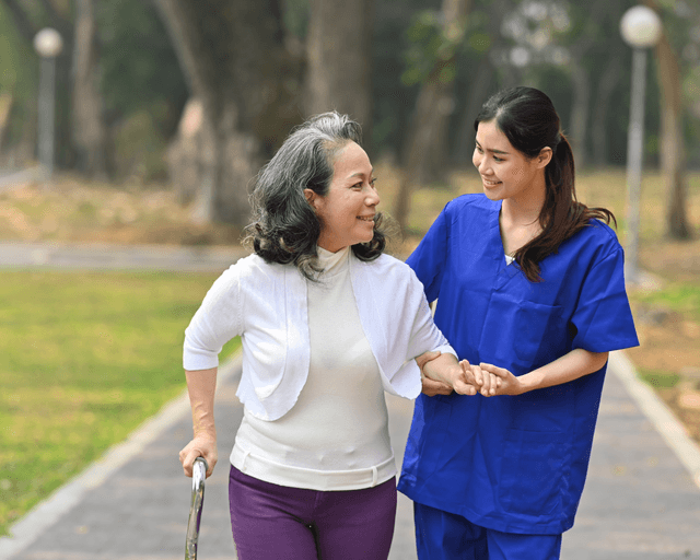 Senior enjoying a pleasant conversation with a caregiver